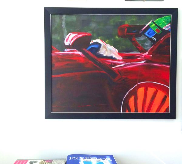 a photo of acrylic painting of felipe massa in red ferrari in black frame on white wall