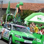 green jersey sprinting caravan car tour de france photograph