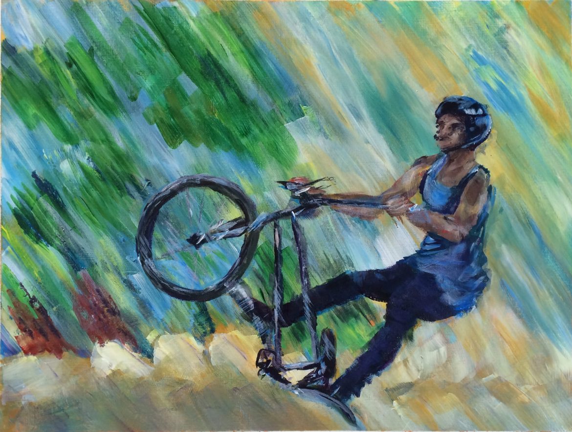 acrylic printing of a stunt cyclist taking off