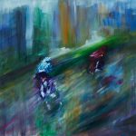two cyclists in rain in city in Tour de France UK 2013